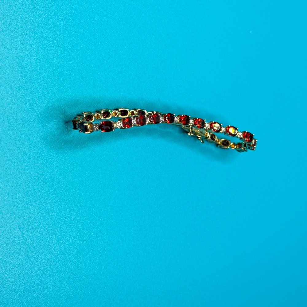 Stunning garnet tennis bracelet.
